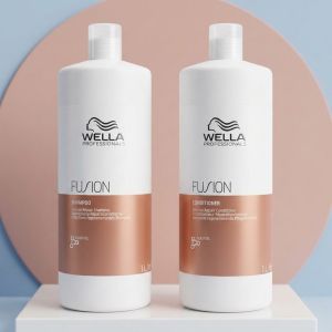 Set intens reparator pentru par deteriorat Wella Professionals Fusion ( Sampon 1000 ml + Balsam 1000 ml )